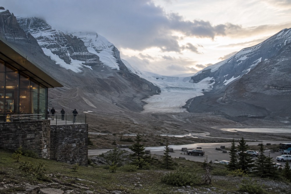 The wide expanse of the Columbia Icefield rising behind the Athabasca Glacier valley